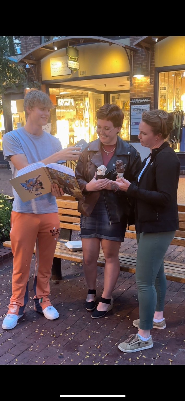 Will Purvis filming street interviews in Boulder Colorado